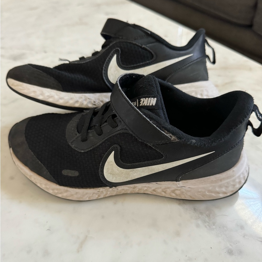 Black Velcro Nike sneakers. Boys size 3.
